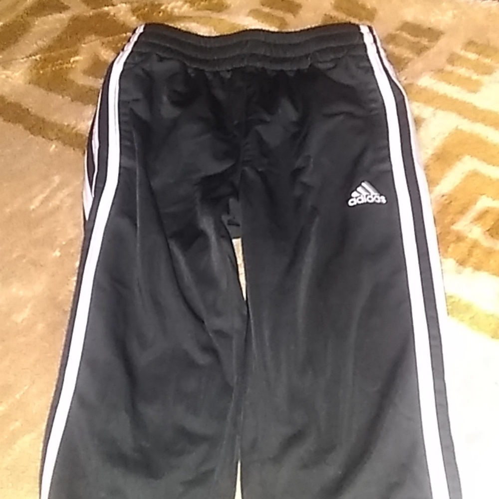 It is 3-stripes regular fit sweatpants